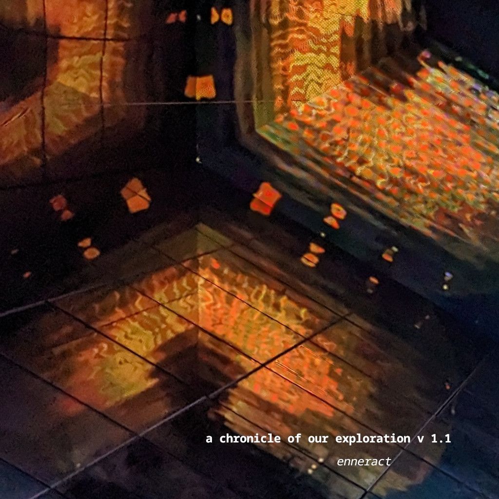 an image of geometric reflections of orangish light structures.